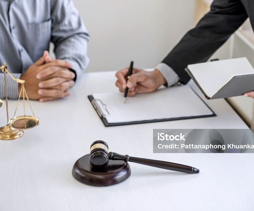 1234 Consultation and conference of Male lawyers and professional businessman working and discussion having at law firm in office. Concepts of law, Judge gavel with scales of justice..